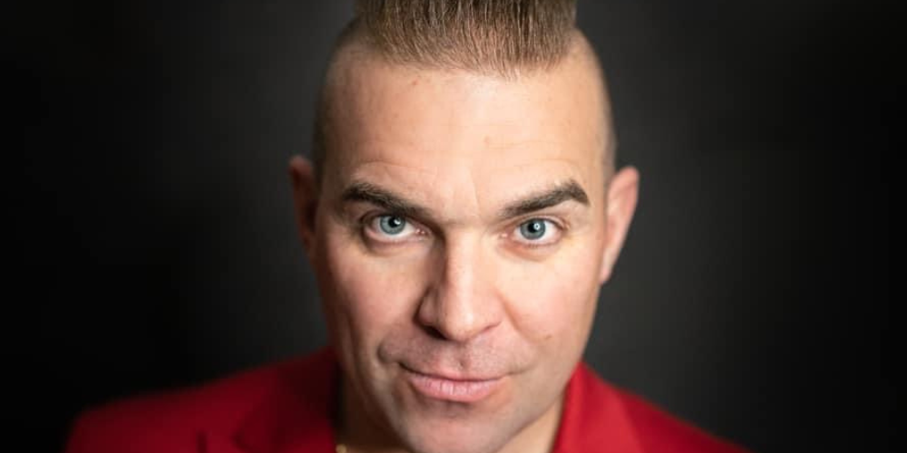 Tony Lewis as Robbie Williams